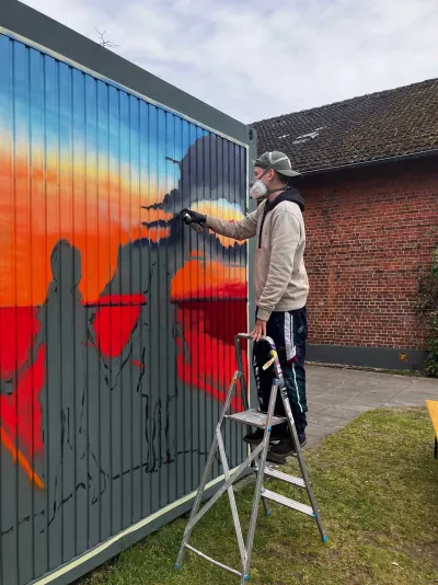 Graffitiartist und Lions Club unterstützen Kinderhort in Norderstedt mit großzügiger Spende