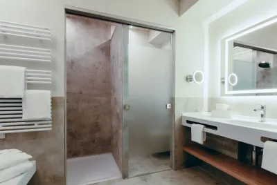 Landhotel Bohrerhof:   Nachhaltige Architektur mit innovativer Duschlösung von Bette
